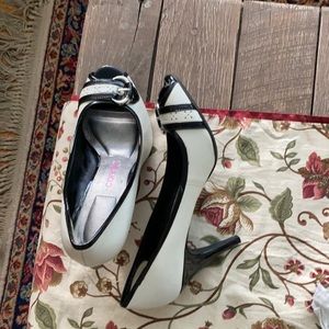 Black and cream faux leather high heels